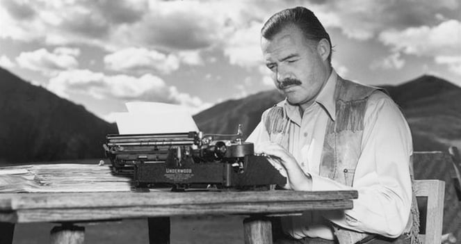 Ernest Hemingway at his typewriter