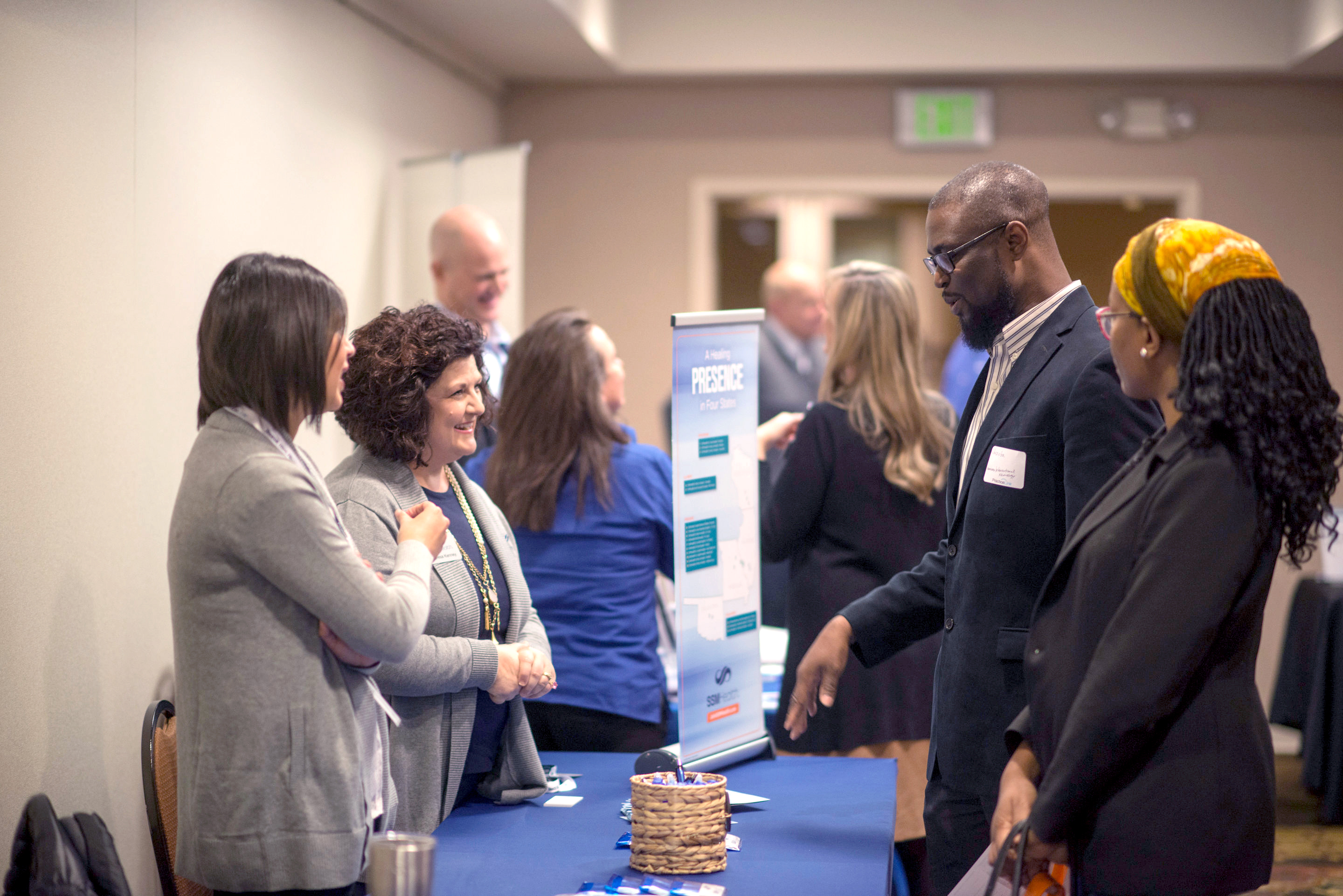 Physician recruiters meeting quality candidates at a PracticeLink Live! Physician Career Fair